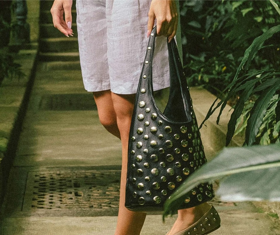 banner mujer bolsos